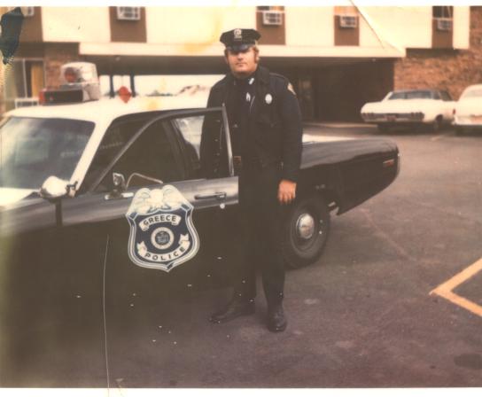 Officer Bob Maslowki and Greece Police Department Patrol Car