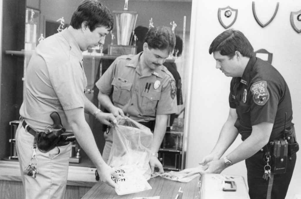 Greece Police Officers Cataloging Evidence